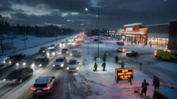 Heavy snow is expected to begin tonight as authorities urge drivers to stay home, even while businesses push to keep normal operations running